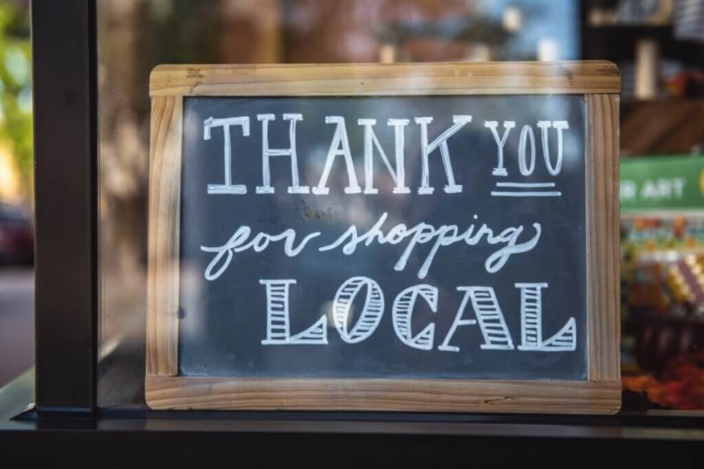 sign reads thank you for shopping local