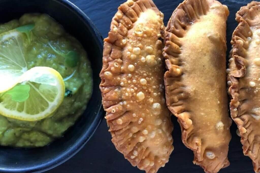 vegan empanadas and sauce from Full Bloom Vegan 